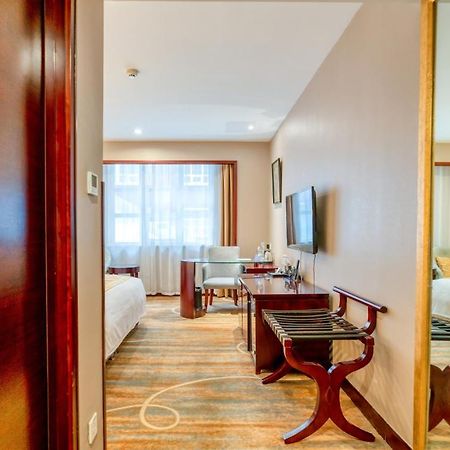 Yantai Meiya International Aparthotel Exteriör bild