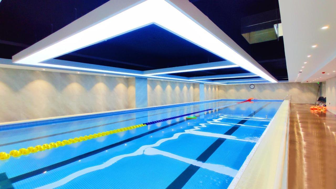 Yantai Meiya International Aparthotel Exteriör bild