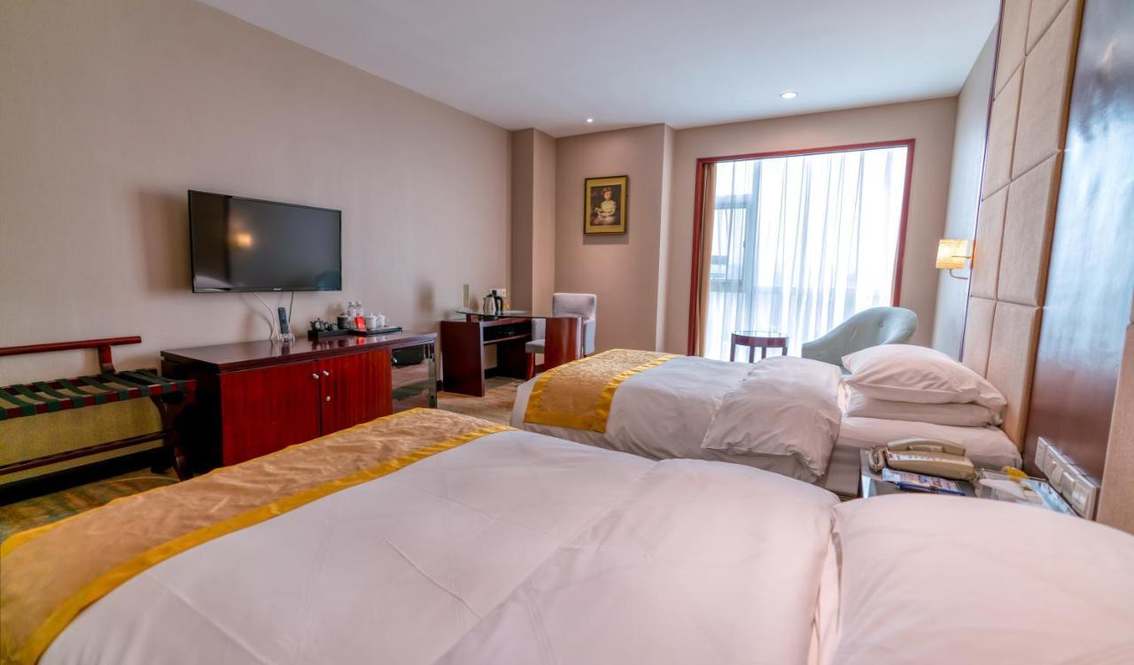 Yantai Meiya International Aparthotel Exteriör bild