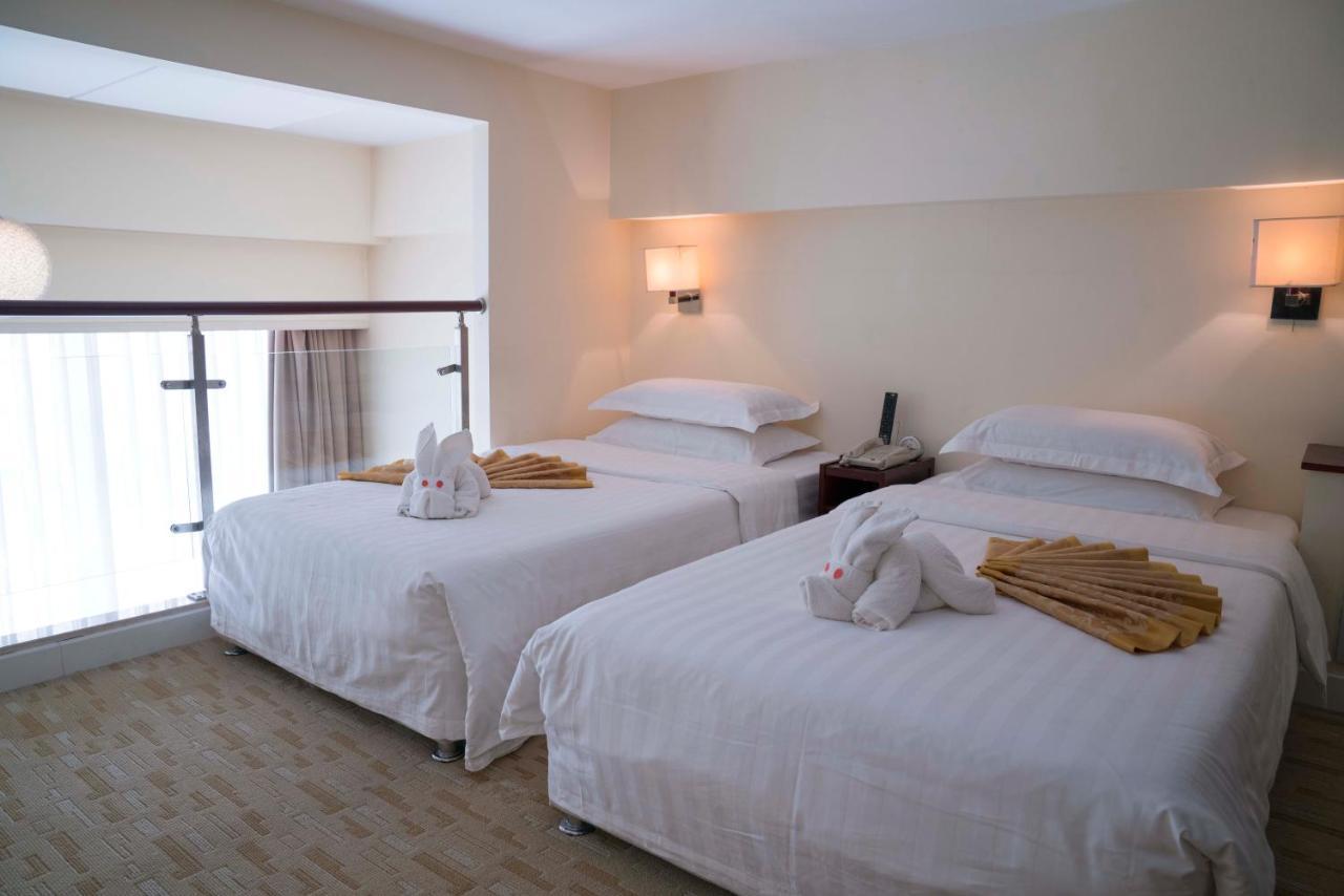 Yantai Meiya International Aparthotel Exteriör bild
