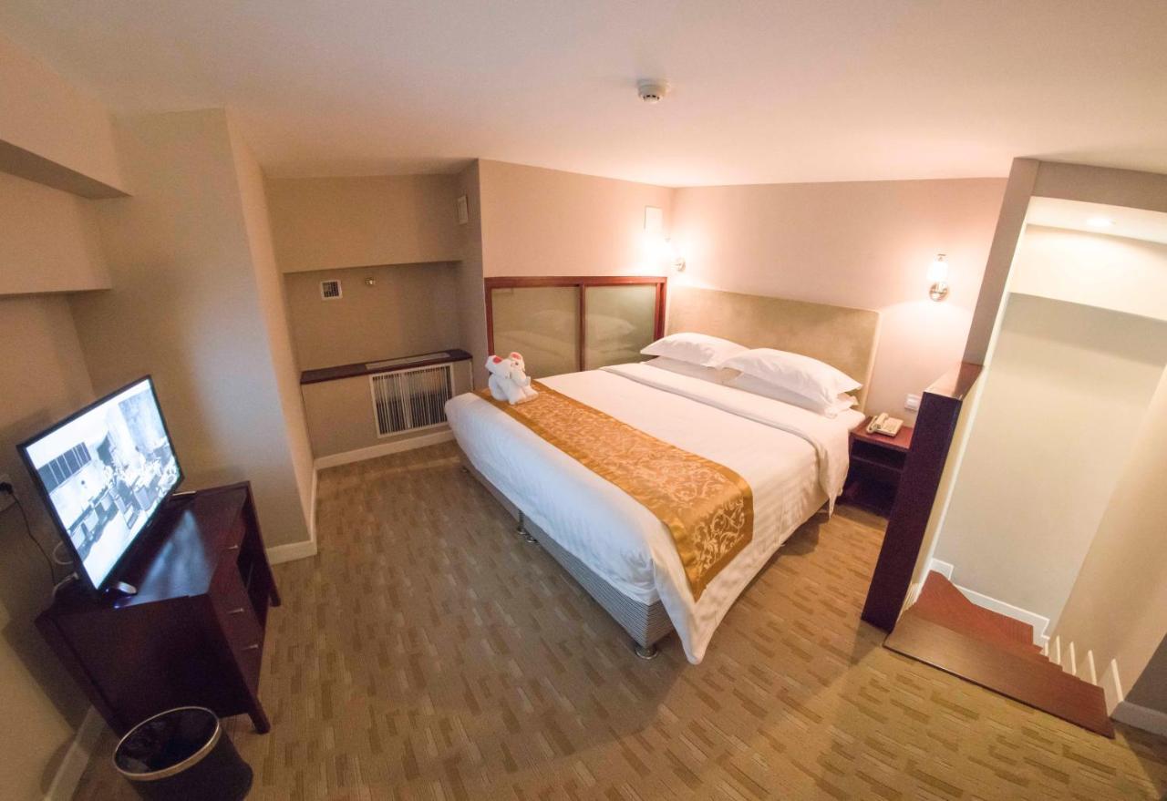 Yantai Meiya International Aparthotel Exteriör bild