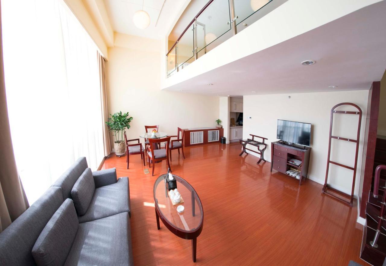 Yantai Meiya International Aparthotel Exteriör bild