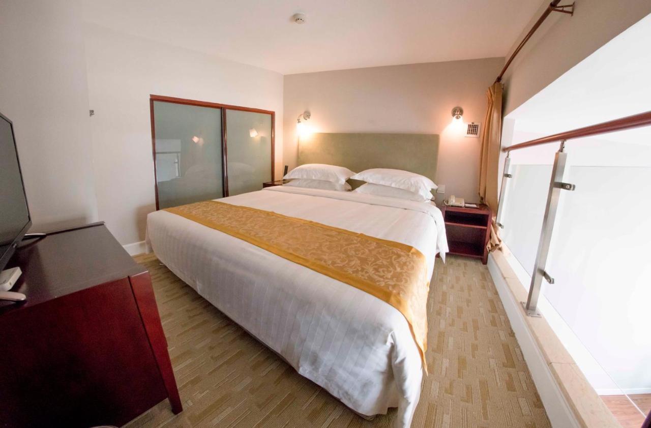 Yantai Meiya International Aparthotel Exteriör bild