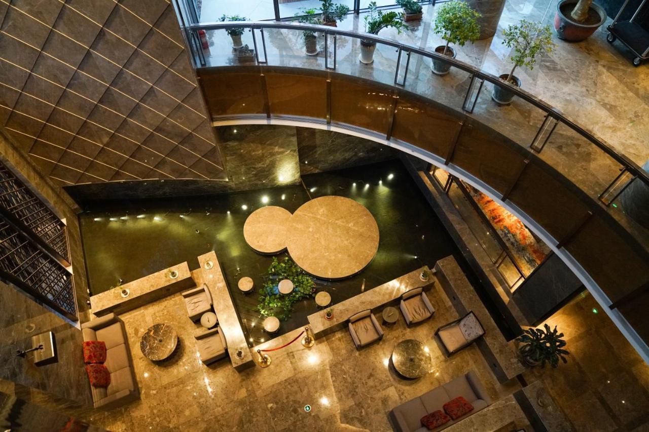 Yantai Meiya International Aparthotel Exteriör bild