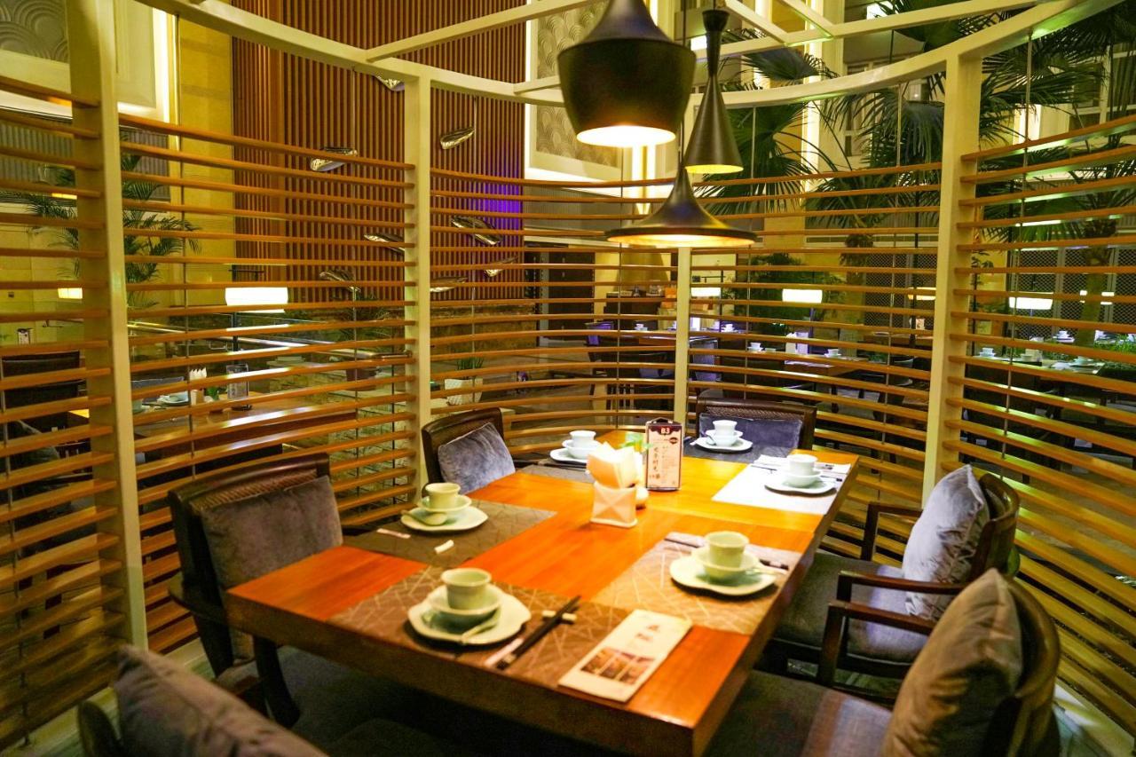 Yantai Meiya International Aparthotel Exteriör bild